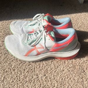 White/multi colored ASICS women running shoes